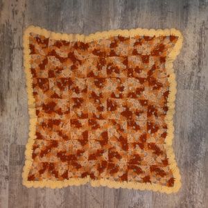 Child's small crocheted blanket